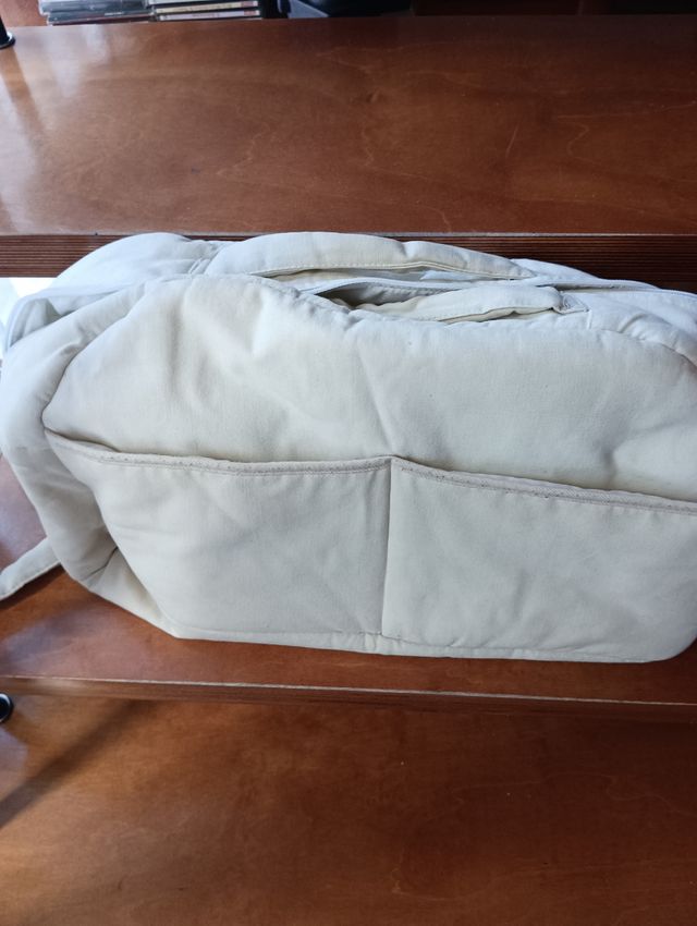 Bolsa bandolera de bebé.