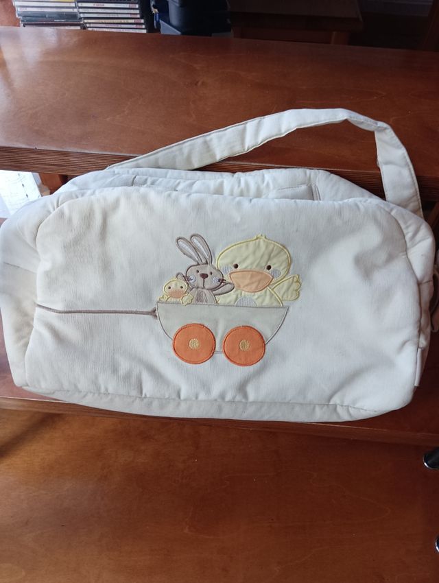 Bolsa bandolera de bebé.