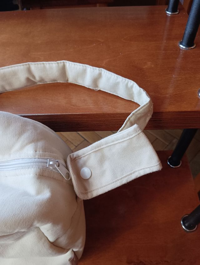 Bolsa bandolera de bebé.