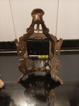 Reloj y candelabros bronce