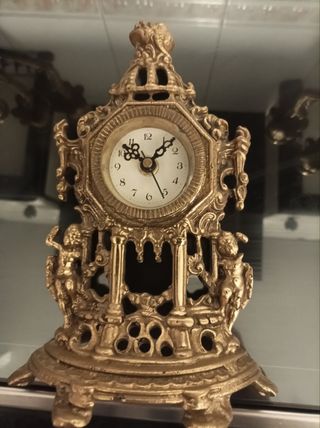 Reloj y candelabros bronce