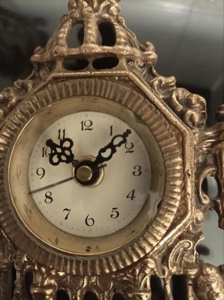 Reloj y candelabros bronce