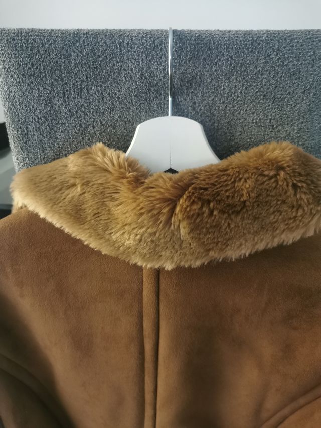 Abrigo prácticamente nuevo.