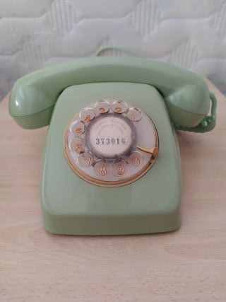 Teléfono vintage rueda baquelita