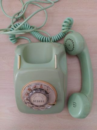 Teléfono vintage rueda baquelita