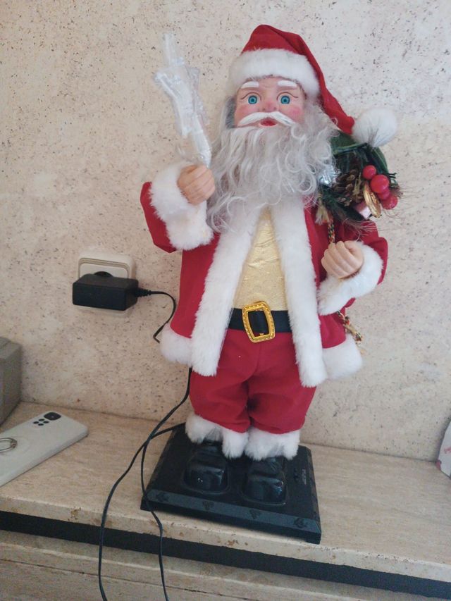 Babbo Natale con musica, luci e scatola