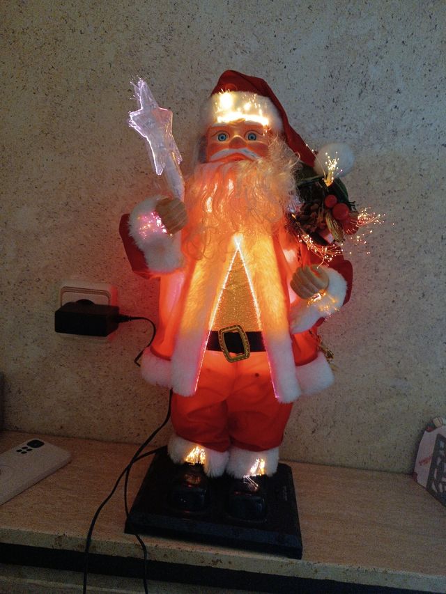 Babbo Natale con musica, luci e scatola