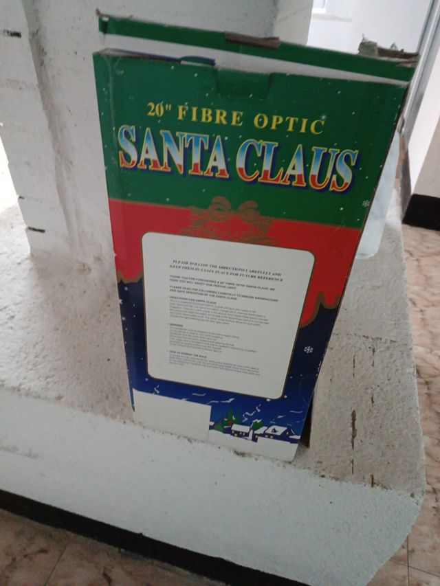 Babbo Natale con musica, luci e scatola