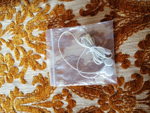 Auricolare. Bianco. Ottimo stato. 