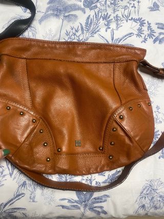 Bolso de cuero marrón, Purificación García