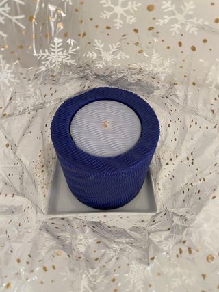 Candela profumata marca Lumen con piatto