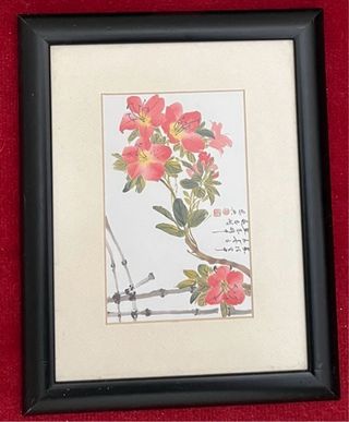 três quadros com gravuras orientais