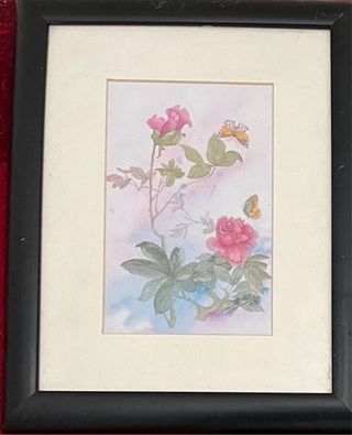 três quadros com gravuras orientais