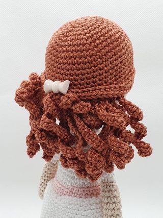 Lory bambola amigurumi pupazzo