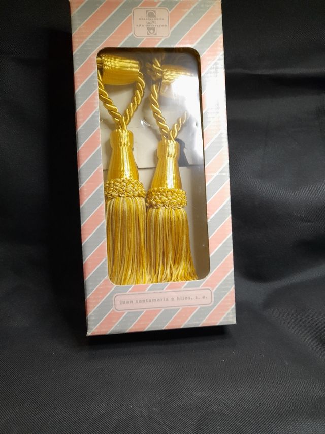 Juego alzapaños dorado