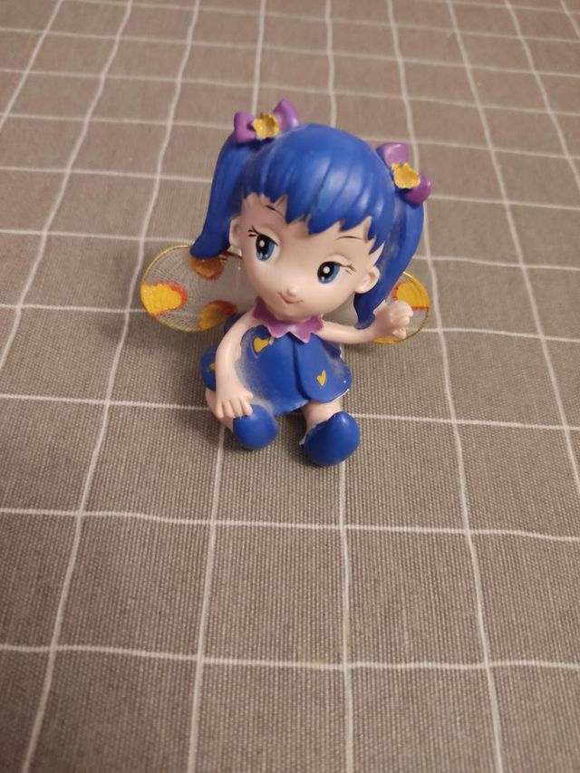 Figura de hada sentada