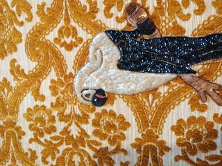 Decorazione. Pappagallo in paiette.