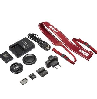 Camara NIKON D3100 rojo lente Nikkor 18-55mm VR