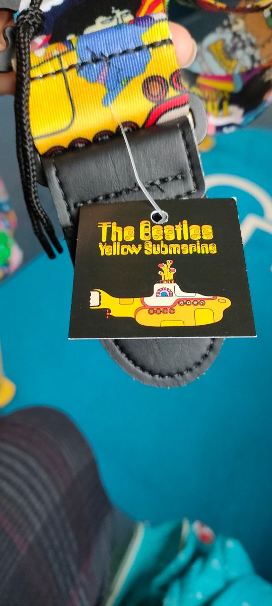 Correa para colgarse guitarra Beatles