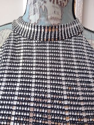 E109-Top plateado fondo negro