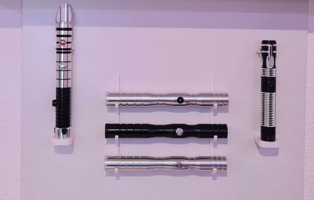 Soporte pares espada laser