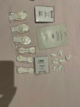 Lote protectores enchufes y cajones niños