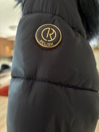 Parka de plumas y pelo sintetico, nueva 
