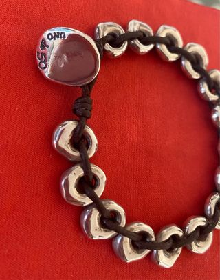 Pulsera Uno de 50 bañada en plata como nueva