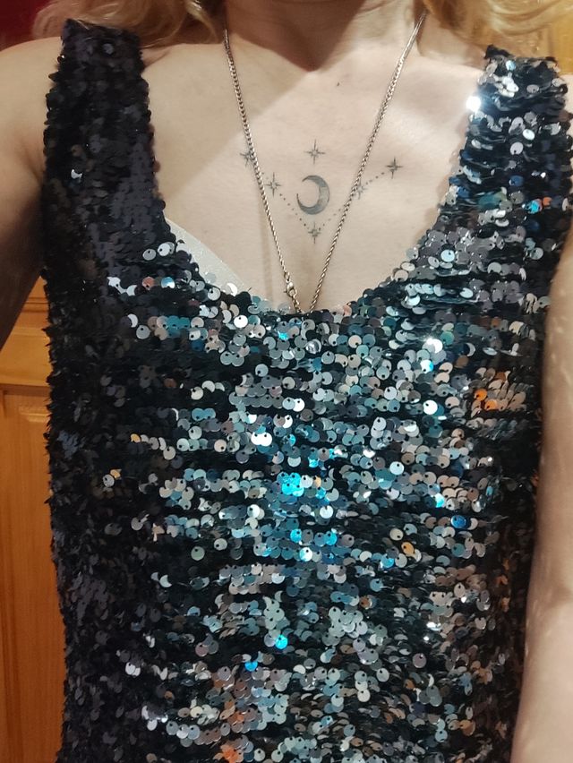 Top lentejuelas nuevo.