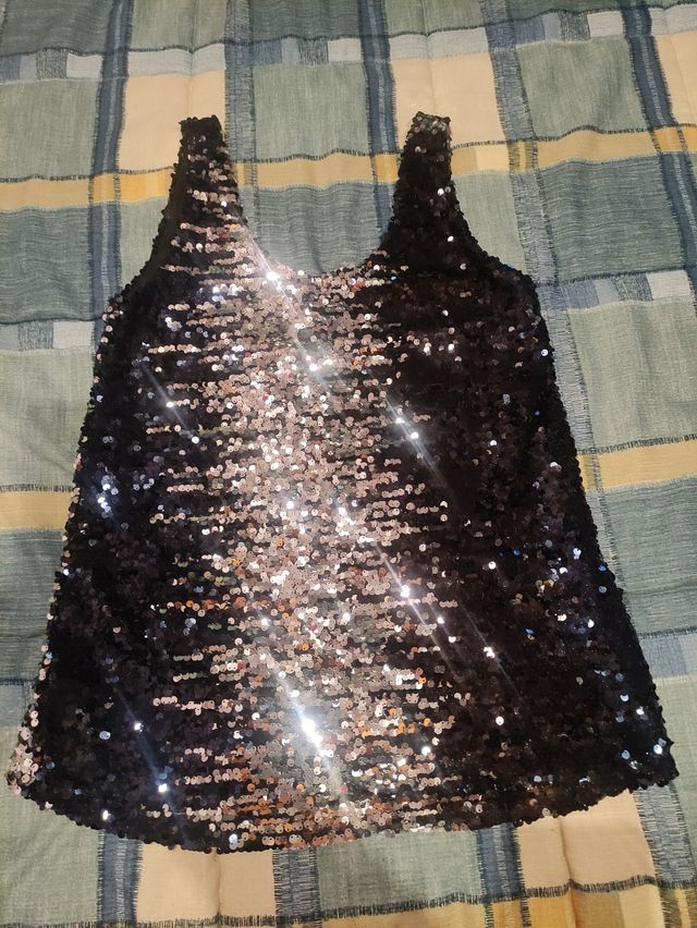 Top lentejuelas nuevo.