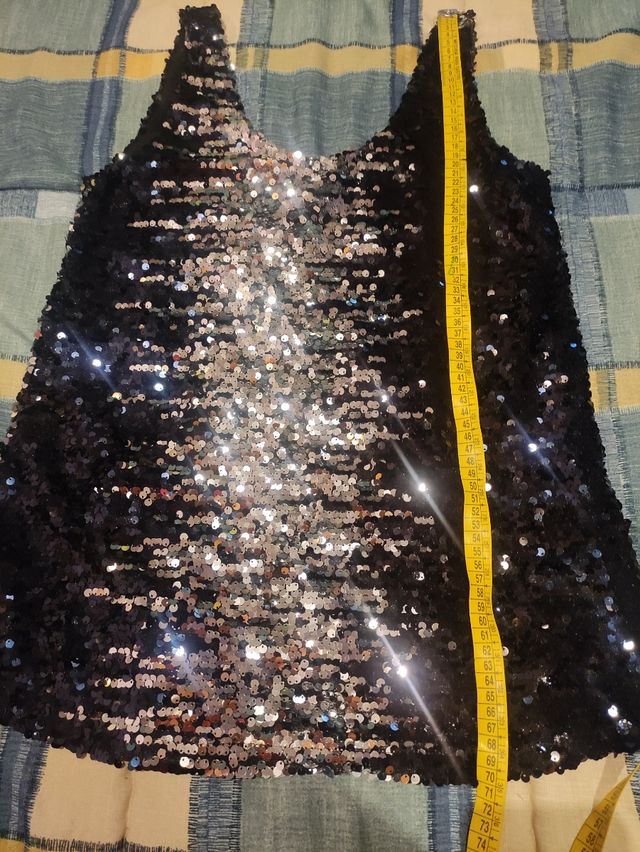 Top lentejuelas nuevo.