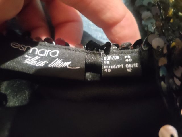 Top lentejuelas nuevo.