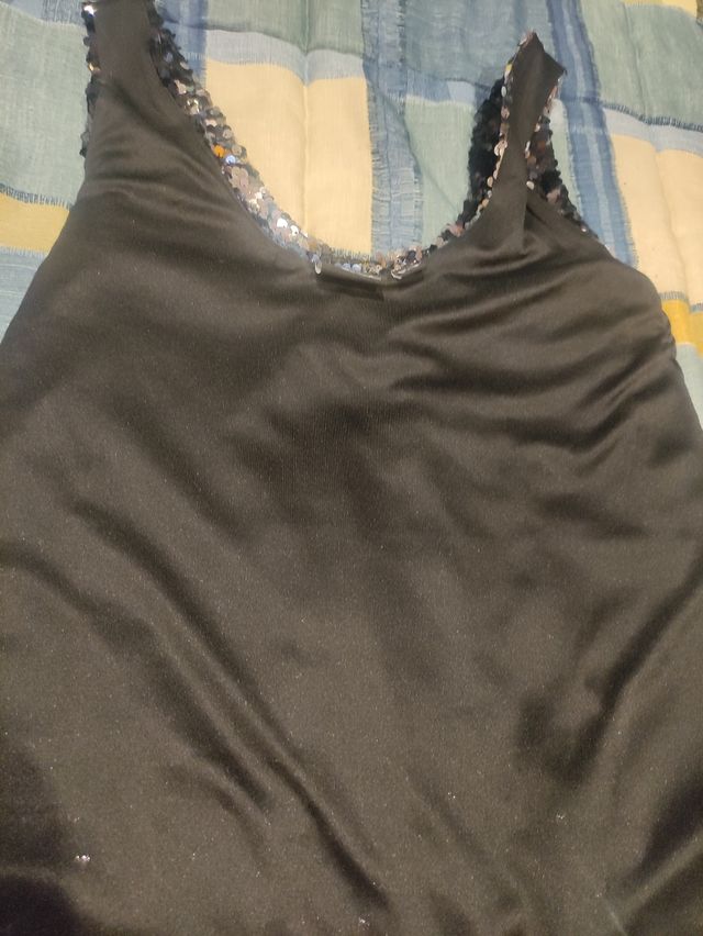 Top lentejuelas nuevo.