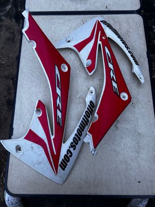 Placas laterales delanteras CRF 450 09