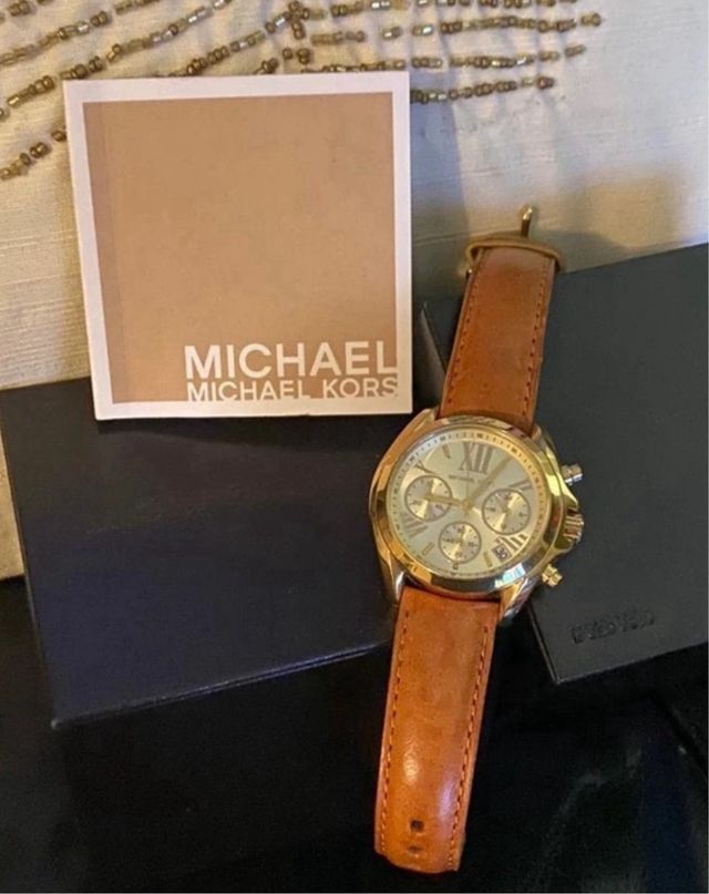 Reloj de seńora Michael Kors. Impecable