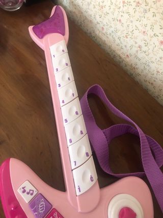 Guitarra “ electrica” juguete