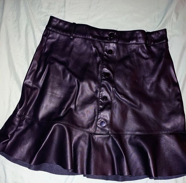 saia de voo em pele preta com botões