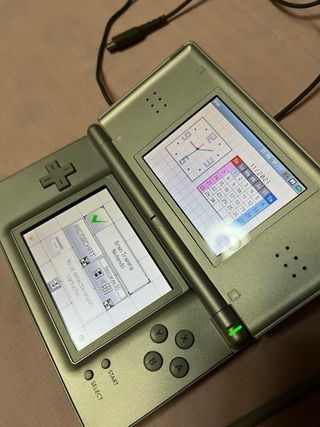 Nintendo DS con funda y 1 juego