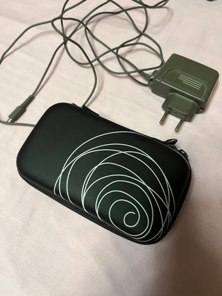 Nintendo DS con funda y 1 juego