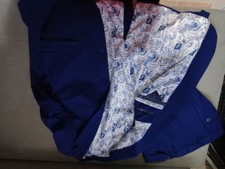 Traje chico al 50% de su precio