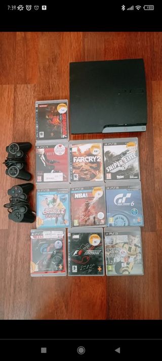 PS3 Sony con mandos y juegos