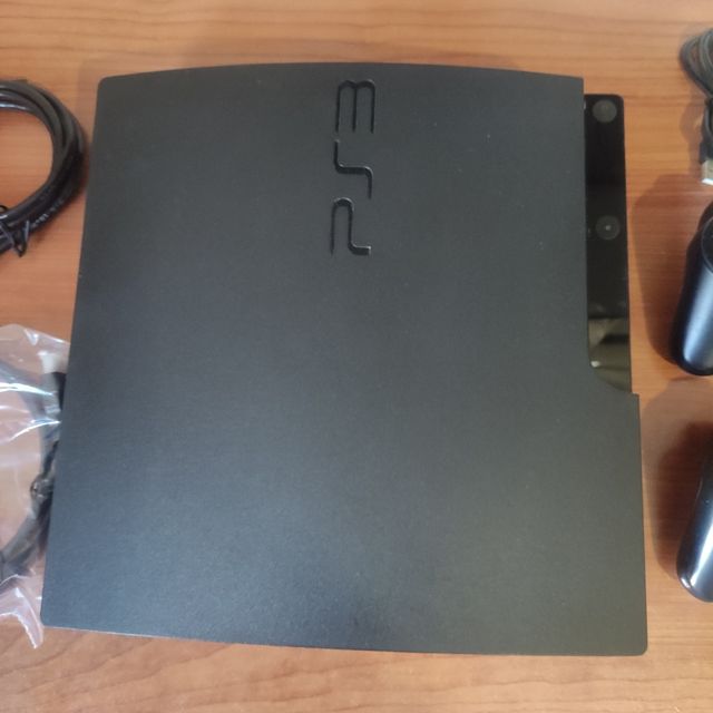 Play Station + 2 mandos