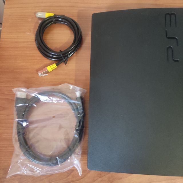 Play Station + 2 mandos