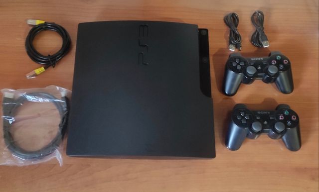 Play Station + 2 mandos