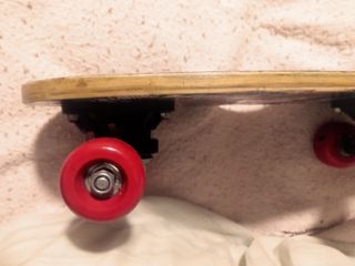 Monopatín mini.