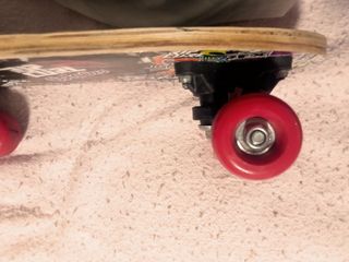 Monopatín mini.