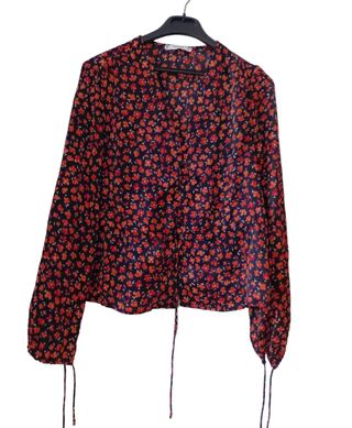 Blusa manga larga satinada Marca Mango