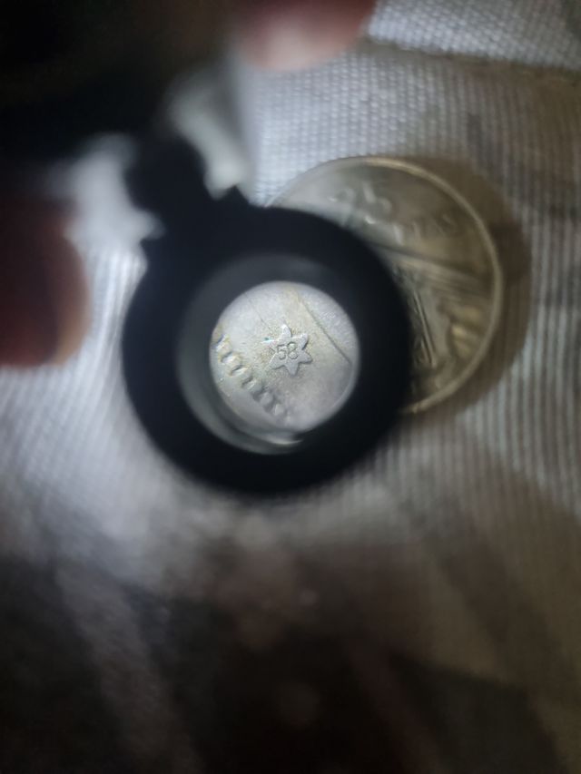 Moneda de 25 ptas de 1957 estrella 58