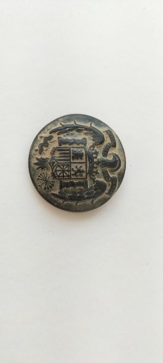 Botón militar antiguo