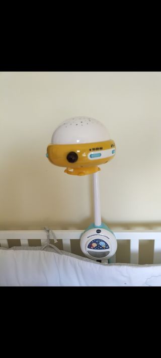 móvil proyector para cuna